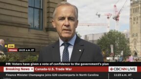 Mark Carney speaking to reporters