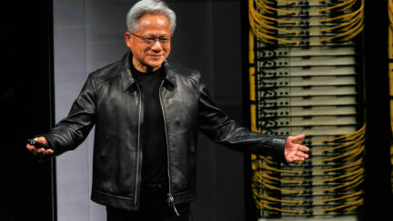 Jensen Huang with his arms wide